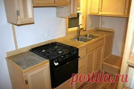 Этот домик площадью всего 33 м². Но когда зайдешь внутрь, захочешь остаться там навсегда!