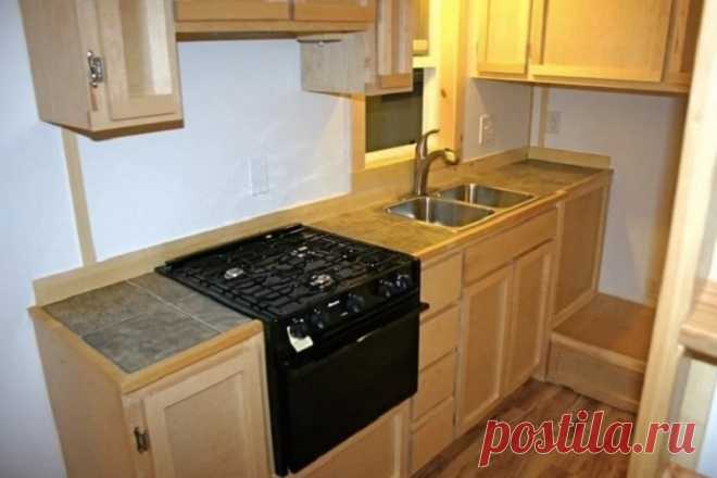 Этот домик площадью всего 33 м². Но когда зайдешь внутрь, захочешь остаться там навсегда!