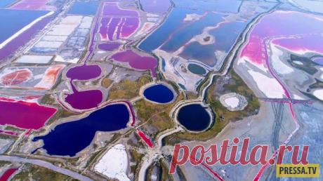 Разноцветные бассейны озера Яньху в Китае (3 фото) | Чёрт побери Соленое озеро Яньху, расположенное в китайской провинции Шаньси, превратилось в красочную палитру из-за необычайно жаркой погоды - столбик термометра в этом районе устойчиво держится на отметке +37°C. Озеро Яньху является одним из трех крупнейших внутренних озер в мире. Оно изобилует съедобными и промышленными солями, такими как сульфат натрия и сульфат магния. Как утверждают специалисты, экстремально высокая...