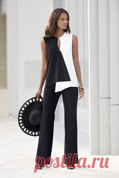 Opposites Attract Pant Suit from Monroe and Main.  Dramatic geometrics curve and contour your shape into ultra-modern flattery. Crossover style top has toggle closure.