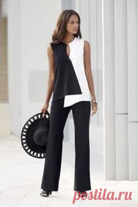 Opposites Attract Pant Suit from Monroe and Main.  Dramatic geometrics curve and contour your shape into ultra-modern flattery. Crossover style top has toggle closure.