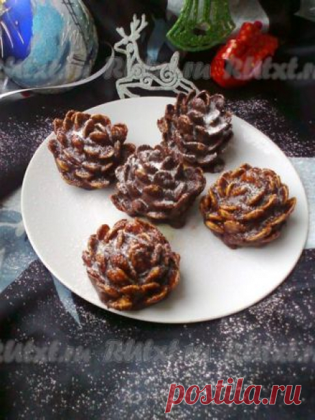 Десерт «Шишки» без выпечки — нарядно и вкусно Мой любимый десерт! Ингредиенты: печенье песочное мягкое (типа » Юбилейное», «К чаю») — 200 г;черный шоколад — 50 гмасло сливочное комнатной температуры — 130 г;какао порошок — 2 ст.л.молоко сгущенное — 190 г (0,5 банки); Для чешуек:черный шоколад — 150 г;кукурузные хлопья — 100 г,сливочное...