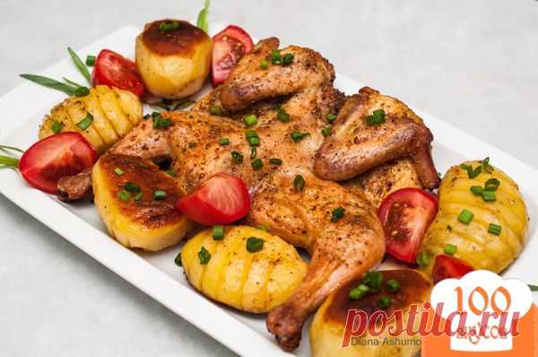 Запеченная курица с картофелем.