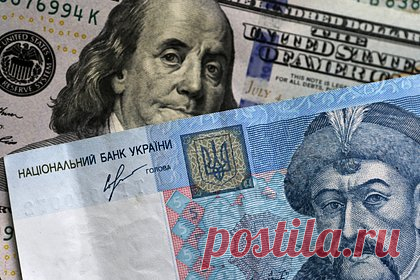 На украинских банкнотах предложили писать скопированную с долларов фразу