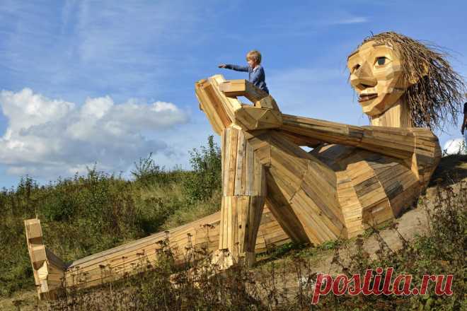 Friendly Giants Built From Recycled Wood Hidden in the Forests of Copenhagen | Colossal