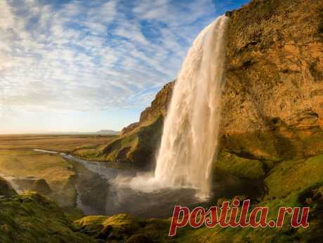 Водопад Сельяландсфосс, Исландия. Автор фото — Кирилл Трубицын: nat-geo.ru/photo/user/50918/