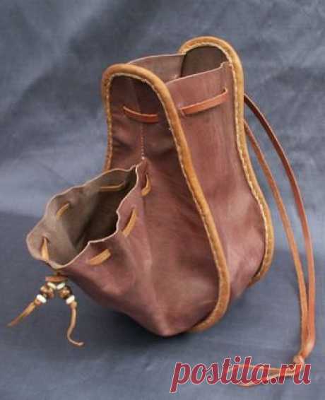 (189) Made from vegtanned calf & goat skins that have been dyed using period dyes and they are made entirely by hand. This design is based on a figure in…