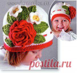 Детская вязаная шапка с цветком