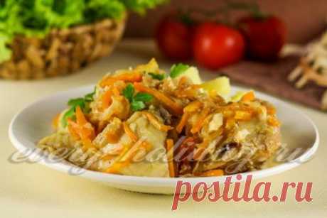 Тушеная рыба с морковью и луком