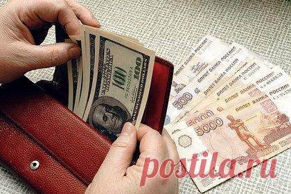 Официальные курсы доллара и евро снизились