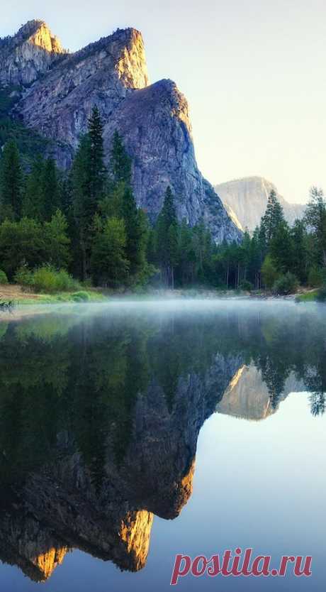 First light on Three Brothers in Yosemite National Park, California • photo: Andrew Mace on Flickr | Stunning Places