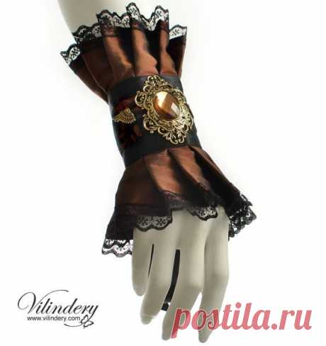 Brown cuff bracelet with a large antiqued filigree от Vilindery