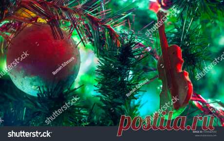 stock-photo-christmas-background-with-the-spruce-branch-multicolored-sparkling-balls-golden-radiant-violin-1599560593.jpg (1500×945)