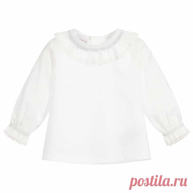 Baby Girls Ivory Cotton Blouse Ivory blouse for baby girls by Paz Rodriguez, made in lightweight cotton. The pretty ruffle collar and cuffs are trimmed in delicate lace.
