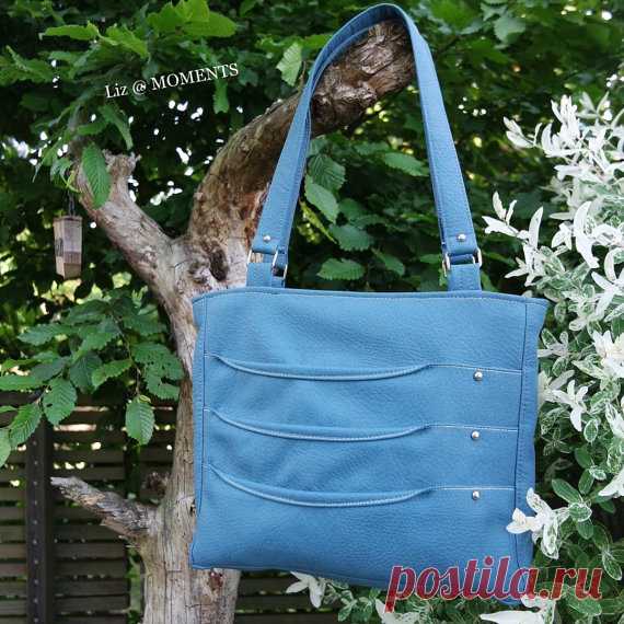 PDF PATTERN: Varuna Bag **PURCHASE IS FOR PDF SEWING PATTERN: not a finished bag ================================ Varuna Bag is the perfect day bag! Take it out for a day of shopping and it will keep everything organized for you! The exterior of the bag features a front with subtle curved accent pleats. The shape of the bag is simple and sleek. The back of the exterior has two large slip pockets for easily accessible items. The inside has a recessed top opening, two slip p...