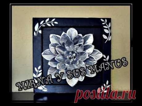 RECICLAJE. flor con latas de aluminio.RECYCLING. flower with aluminum cans.