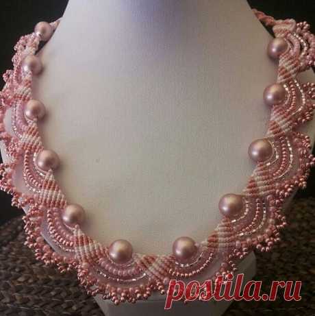 the necklace is made in art of macrame with swarovski pearls, Preciosa sead beads . The necklace is adjustable . Please contact me if you have any questions or would like to order a custom design.