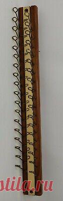 Vintage Tie Scarf Belt Hanger Wall Mount Organizer Wood Brass Slider 18 Hooks  | eBay Vintage Tie Scarf Belt Hanger Wall Mount Organizer Wood Brass Holder 18 Hooks 
In Used Condition.  All Flip Up and Down Great. Installation Hardware on Back. And Shows A Little Wear And Scuffs On Spots. Works Great! Installs On Wall With Hardware. Measures About 19