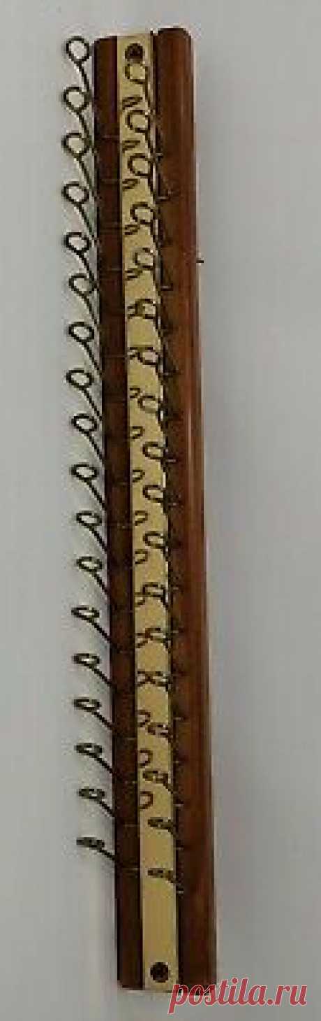 Vintage Tie Scarf Belt Hanger Wall Mount Organizer Wood Brass Slider 18 Hooks  | eBay Vintage Tie Scarf Belt Hanger Wall Mount Organizer Wood Brass Holder 18 Hooks 
In Used Condition.  All Flip Up and Down Great. Installation Hardware on Back. And Shows A Little Wear And Scuffs On Spots. Works Great! Installs On Wall With Hardware. Measures About 19" Long By 2" Wide ...