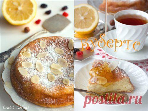 Бубертс - изюм	(по желанию) — 1 горсть
яйцо	— 4 шт.
миндаль	(очищенный, измельченный) — 50 гр.
молоко	— 500 мл.
ванильный сахар	— 1 ч. л.
сахар	— 3-4 ст. л.
крупа манная	— 100-120 гр.
соль	(по вкусу)
масло сливочное	(для смазывания формы) — 0,5 ст. л.