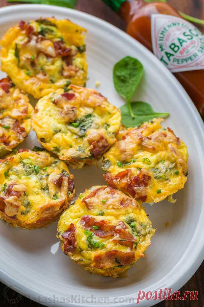 Breakfast Casserole Muffins (VIDEO Recipe) - NatashasKitchen.com Breakfast casserole muffins come together quickly. Loaded with potato, spinach, eggs, cheese and crisp bacon. Freezer friendly make-ahead breakfast muffins!