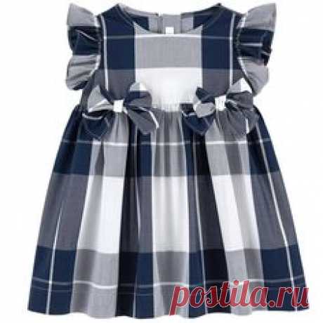 Cotton percale Dress: Light Without lining Hourglass cut Crew neck Sleeveless Flounces on the shoulders Very flared bottom Buttons in the back Logo buttons Ch