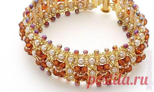 Браслет Кристаллические мосты будет гармонировать с любым нарядом благодаря разнообразию цвета и форм бусин. 
http://www.bijoubeads.ru/sxemy/braslet/braslet-kristallicheskie-mosty/