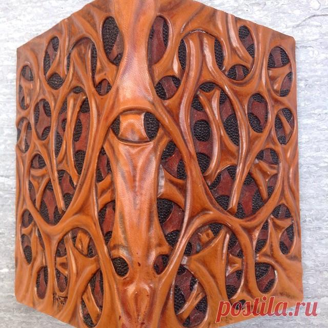 Organic texture on organic material #book cover #leather carving