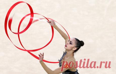 Маргарита Мамун. © Станислав Красильников/ТАСС. 
РИО-ДЕ-ЖАНЕЙРО, 21 августа. /ТАСС/. Россиянка Маргарита Мамун завоевала золото олимпийского турнира по художественной гимнастике в личном многоборье. По итогам четырех упражнений спортсменка набрала 76,483 балла. Подробнее на ТАСС: https://tass.ru/sport/3554332  |  ТАСС: Спорт - Маргарита Мамун завоевала золото ОИ-2016 в художественной гимнастике в личном многоборье