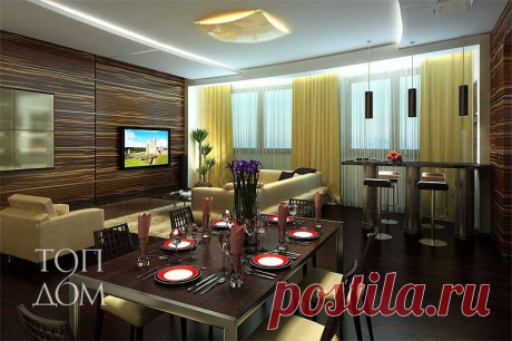Интерьер открытой гостиной в коричнево-ванильных тонах