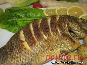 Рыба жаренная целиком с хрустящей корочкой.