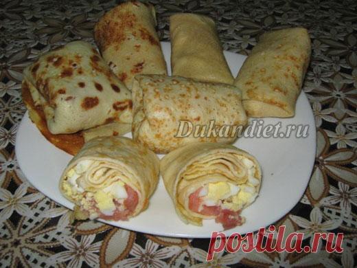 Блины на кефире без отрубей | Диета Дюкана

Яйцо - 1 шт.,
кефир или йогурт (0%) - 2 ст. л.,
кукурузный крахмал - 1 ст. л.,
сах.зам и соль по вкусу.

Все ингредиенты тщательно смешиваем, разогреваем сковородку с антипригарным покрытием и выпекаем блинчики.

Для начинки можно использовать отварные яйца и мелко порезанную соленую форель.