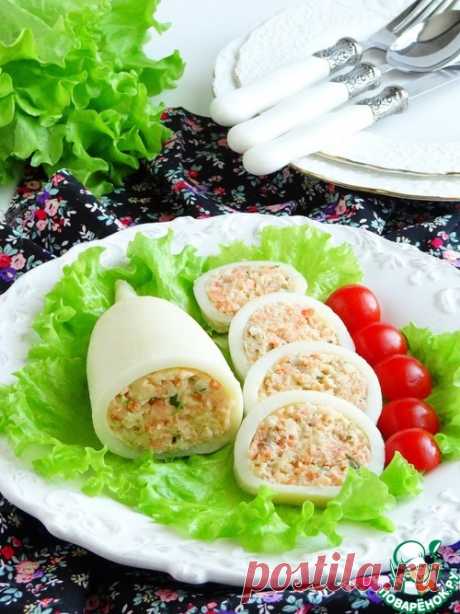 Кальмары, фаршированные треской и форелью - кулинарный рецепт