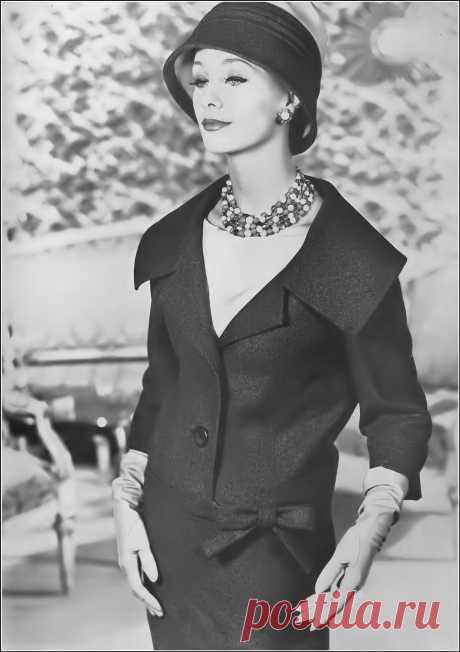 Joy Weston in gray flannel, short jacket ending in a bow, … | Flickr