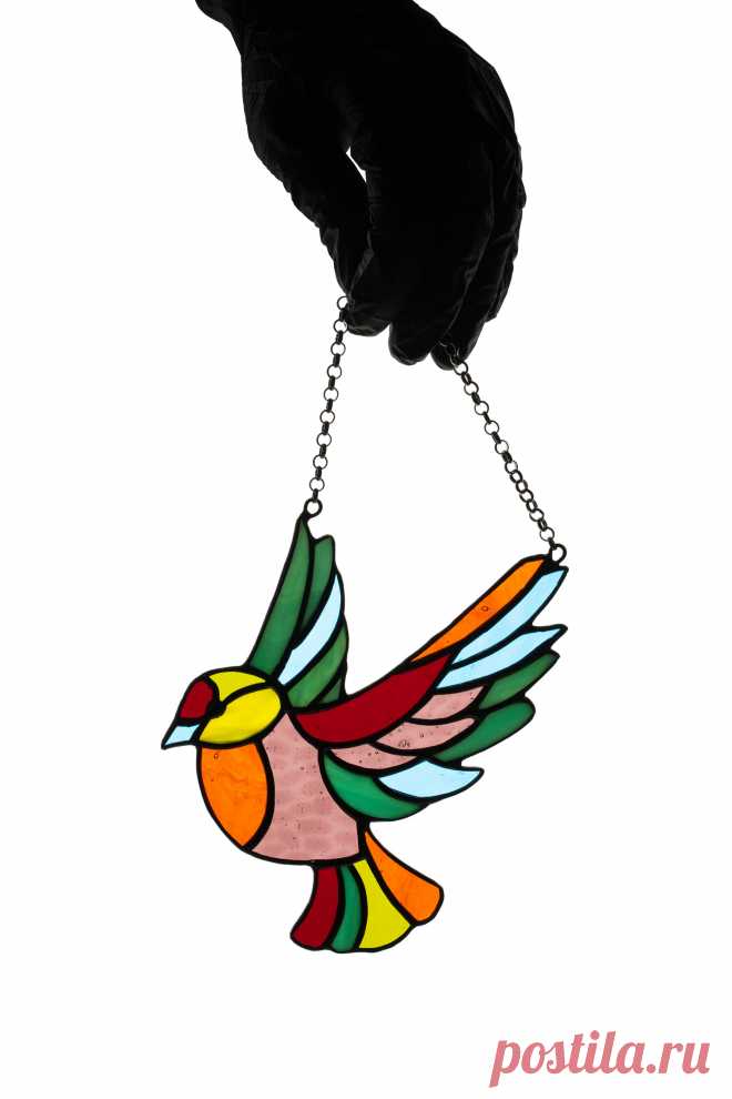 Stained glass suncatcher Single bird Window hanging bird Garden decor  Window hanging suncatcher made of stained glass pieces by my own disign.Handmade using Tiffany copper foil technique.Looks amazing in the lights of a sun.You will get it completely ready for installation. It comes with a suction cup hanging and copper chain.It will be a great gift for friends or relatives. Width: 4 inc
