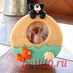 Cat hanging on a fish bowl picture frame | Flickr - Photo Sharing!
