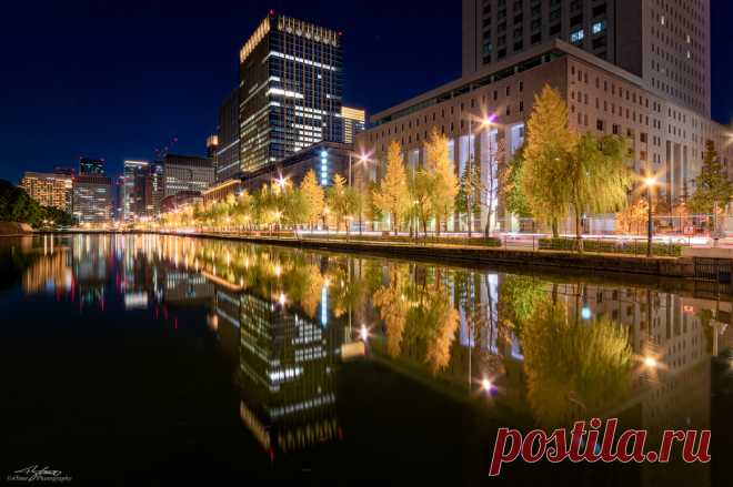 Lost in Parallel World, Tokyo Marunouchi An urban landscape of architectures and skyscrapers in Tokyo Marunouchi, Hibiya districts with the reflections on the surface of Hibiya-Bori Moat at Night. Taken in Chiyoda-Ward, Tokyo, Japan  千代田区 日比谷濠にて。  丸の内/日比谷摩天楼群夜景の日比谷濠への映り込みが作り出すパラレルワールド。  Pentax K-3, Sigma 10-20mm F4-5.6 EX DC /HSM. On November 30, 2019, 18:27. Focal 13mm / Aperture f11 / ISO100 / Exposure 60s.  RAW development (16bit TIFF) in Adobe Photoshop Lightroom Class...
