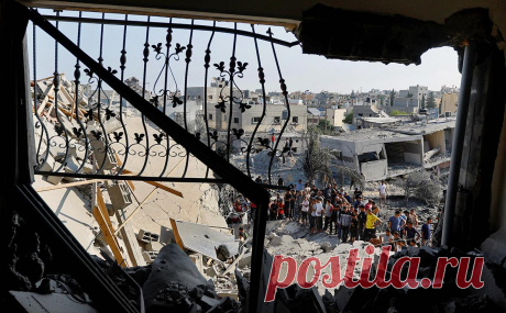 Число погибших от атак Израиля палестинцев выросло до 2,2 тыс.. В секторе Газа и на Западном берегу реки Иордан за время войны боевиков палестинского движения ХАМАС и Израиля погибли 2215 человек, сообщает агентство WAFA со ссылкой на Минздрав Палестины.