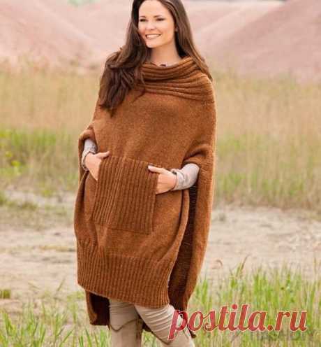 ВЯЗАНОЕ ПОНЧО С КАРМАНОМ-КЕНГУРУ,
описание: https://nash-diy.ru/vjazanie-dlja-zhenschin/teplye-kof..