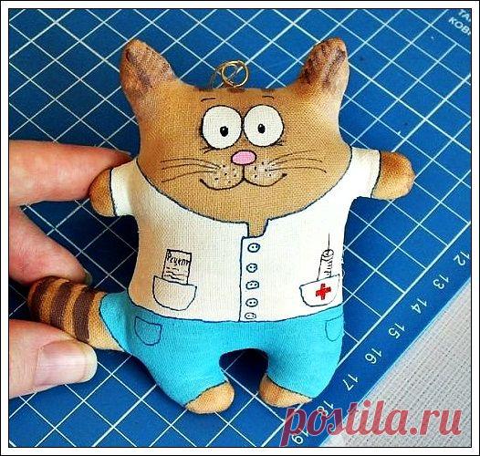 Игрушка котик