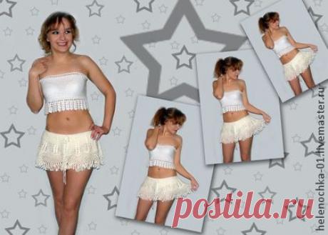 Юбка кремовая короткая.