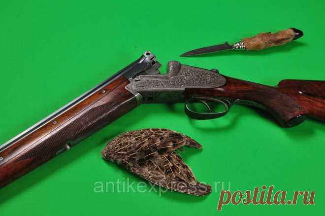Полнозамочное ружье компании Lebeau Courally СЕРИЯ "Bascul Ronde" ( круглая колодка) начало 30-х годов, калибр 12/65, . Состояние идеальное, 100% сохран лака и калки. Вес ружья 2 900 гр., L - стволов 700 мм., сверловка каналов - 18,5 (в стволах "зеркало"). Сужения: правый - 0,8, левый - 1,0. Длинна ложи от переднего крюка до абреза ложи -37 см., передний крюк подпружинен, не автоматический предохранитель, брандтрубки, эжектора, "потроха" золоченые.