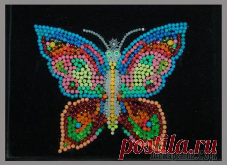 Бабочка из пластиковых пулек