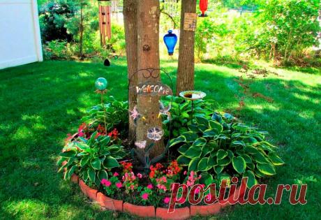 Оформление деревьев на садовом участке - много фото