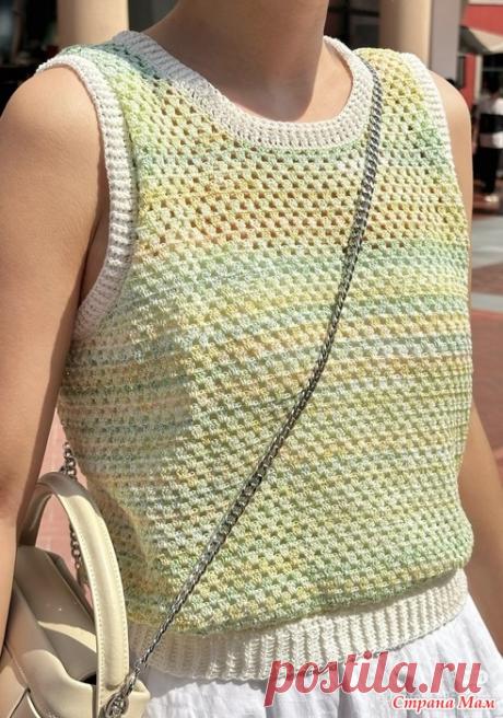 Простой топик из меланжевой пряжи. Обхват груди 90 см. Длинна 48 см. Пряжа тонкий хлопок меланж и однотонный цвет крючок 1.75 мм. Основной узор Проймы https://www.liveinternet.ru/