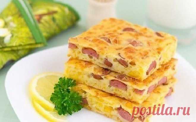 Вкусный пирог с сыром и сосисками на завтрак на всю семью 
Ингредиенты: 
- кефир - 250 мл. - мука пшеничная - 150 гр. - яйцо куриное - 2 шт. - сыр твёрдый - 200 гр. - сосиски - 200 гр. - разрыхлитель - 1 ч. л. - соль - по вкусу Приготовление: 
1. Сыр натерет…