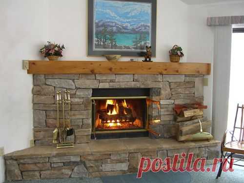 Обустройство гостиной с камином и телевизором: фото идеи
