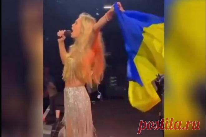 Двойное дно. Брежневу осудили за песни на русском с украинским флагом. Вера Брежнева поет на русском языке, размахивая при этом украинским флагом. Что это?