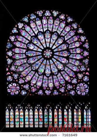 Stained glass window in Notre dame cathedral, Paris, France photo from Shutter Stock  |  Найдено на сайте flickr.com.