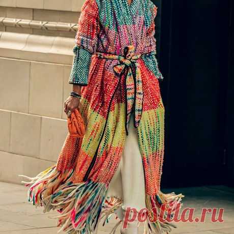 Photo by NET-A-PORTER on September 30, 2020. May be an image of one or more people and outerwear.